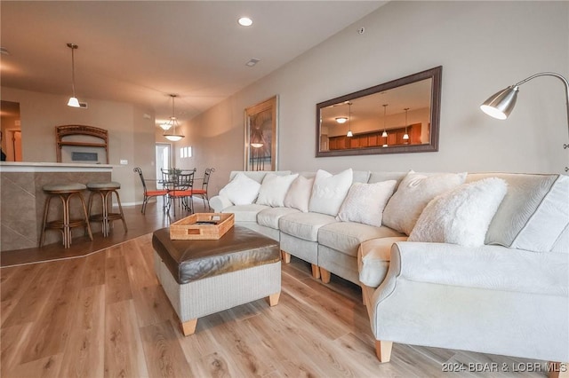 living room with light hardwood / wood-style floors