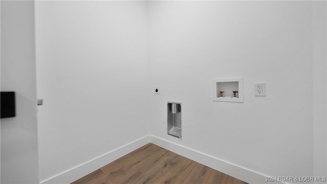 laundry room featuring hookup for an electric dryer, washer hookup, and hardwood / wood-style flooring