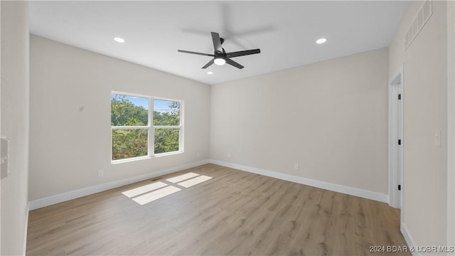 unfurnished room with light hardwood / wood-style floors and ceiling fan