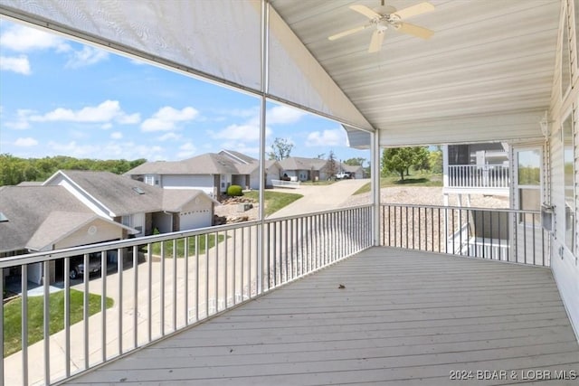 wooden deck with ceiling fan