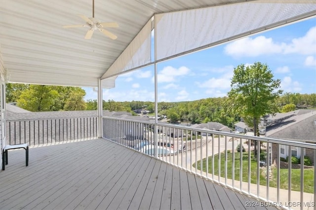 wooden terrace with ceiling fan