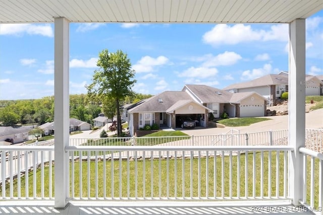 view of front of house featuring a front yard and a garage