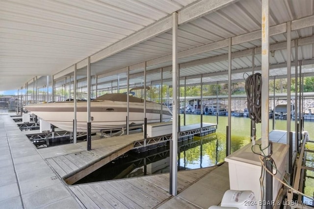 dock area featuring a water view