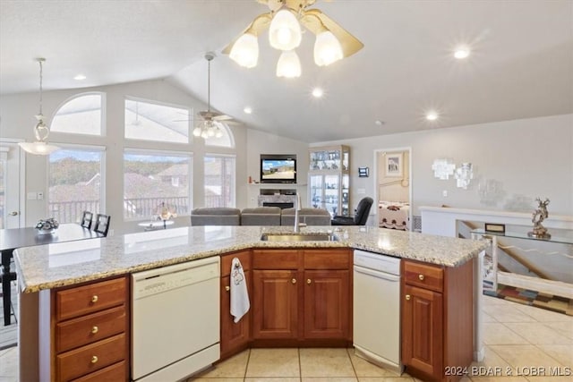 kitchen featuring plenty of natural light, ceiling fan, dishwasher, and a center island with sink