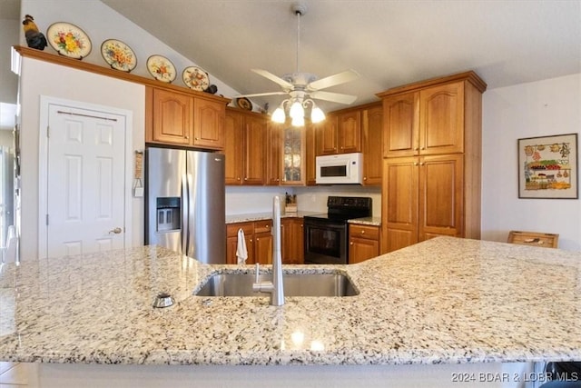 kitchen with lofted ceiling, sink, ceiling fan, black range with electric cooktop, and stainless steel fridge with ice dispenser