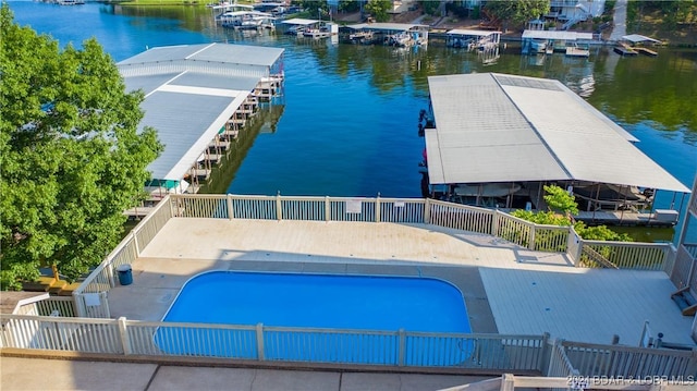 view of pool with a water view