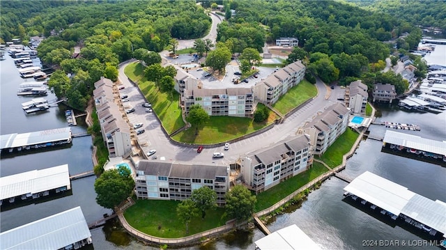 birds eye view of property featuring a water view