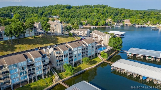 bird's eye view with a water view