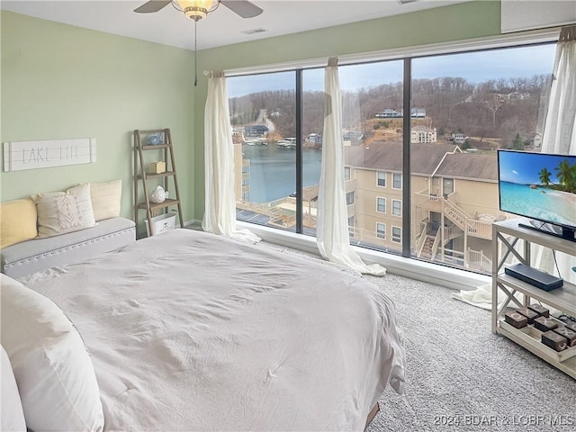 bedroom with carpet flooring and ceiling fan