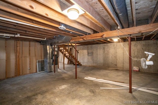 basement featuring heating unit