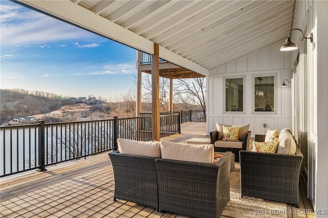 wooden deck featuring an outdoor hangout area