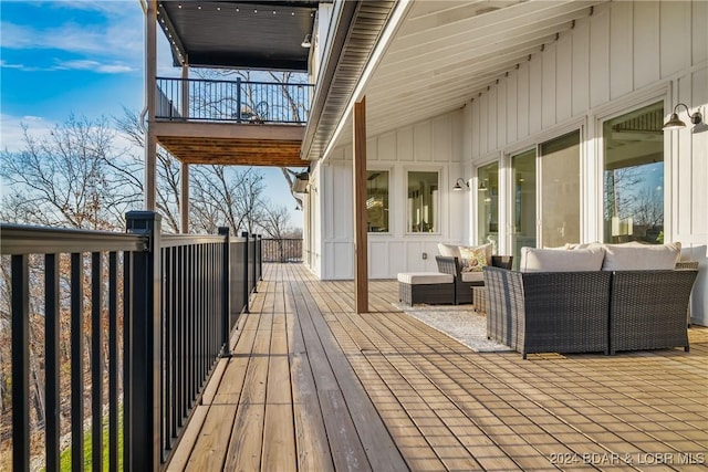 deck with an outdoor living space