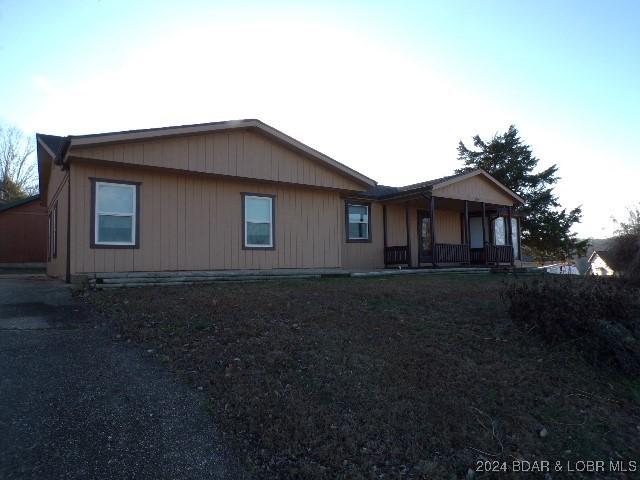 view of front of home featuring covered porch