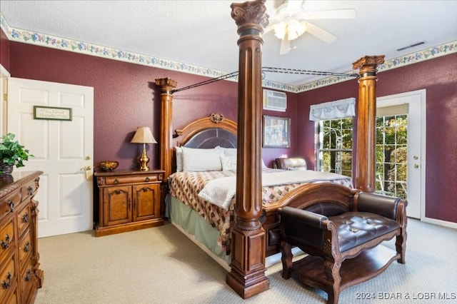 carpeted bedroom featuring access to exterior and ceiling fan