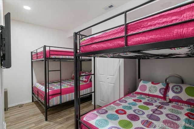 bedroom featuring hardwood / wood-style flooring