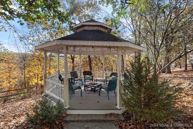 6334 Red Barn Rd, Osage Beach, MO 65065 - wooden terrace with a gazebo and an outdoor fire pit