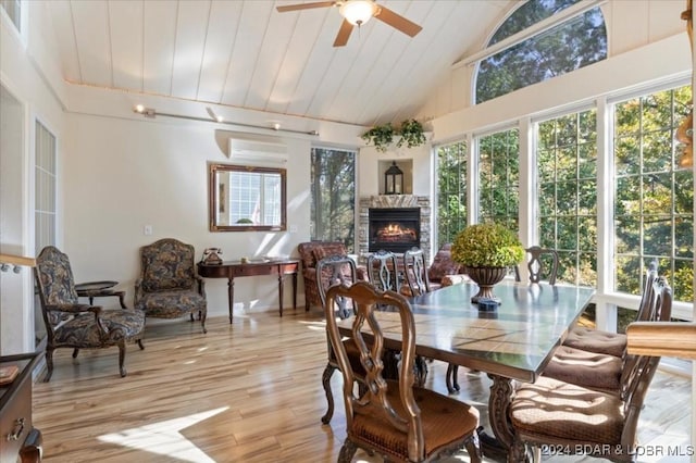 6334 Red Barn Rd, Osage Beach, MO 65065 - sunroom / solarium featuring lofted ceiling and a wall unit AC