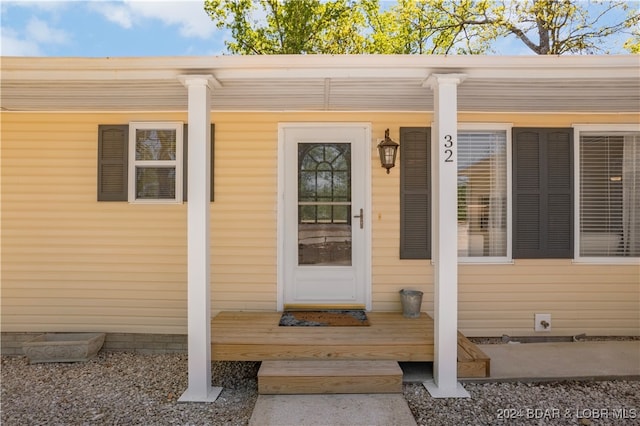 entrance to property with a porch