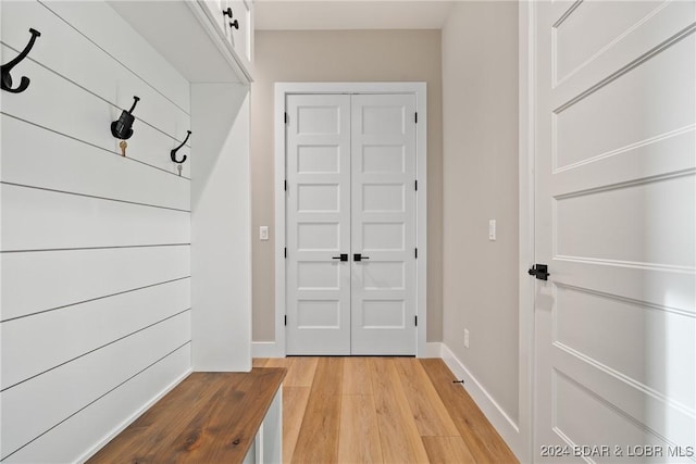 mudroom with light wood-type flooring