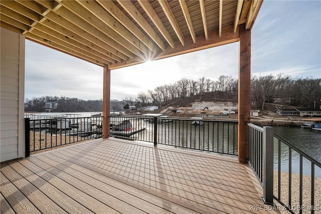 deck featuring a water view