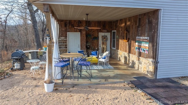 view of patio / terrace featuring ceiling fan and grilling area