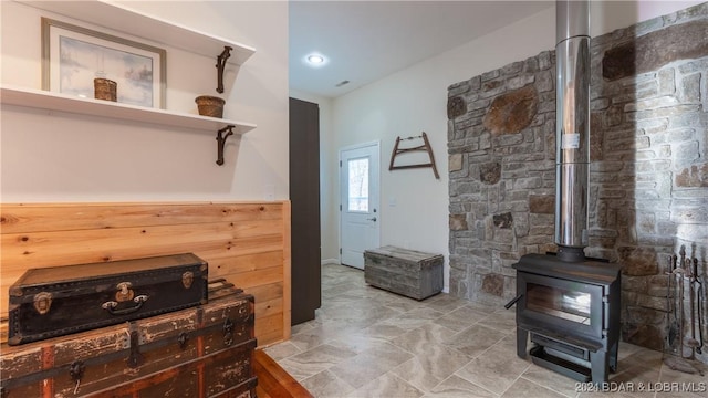 interior space with a wood stove