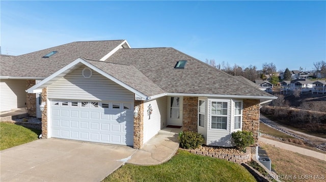 ranch-style home with a garage