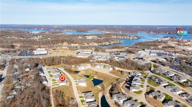 drone / aerial view featuring a water view