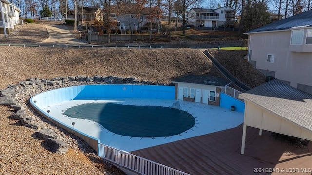 view of pool featuring an outdoor structure