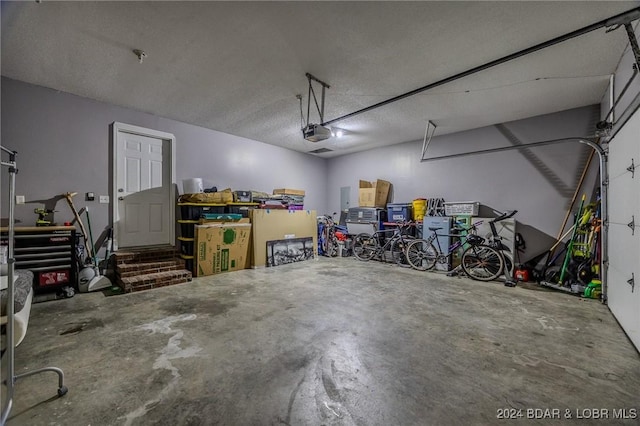 garage featuring a garage door opener