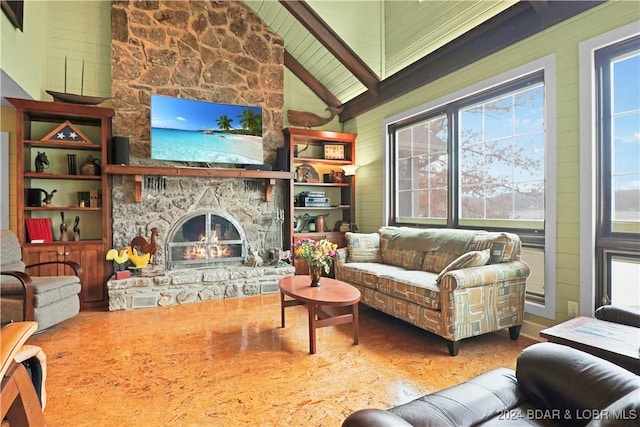 living room with wooden walls, a fireplace, high vaulted ceiling, and wood ceiling