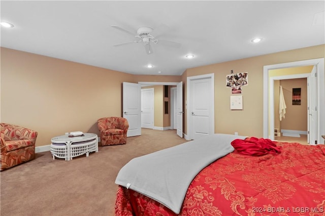 bedroom with light carpet and ceiling fan