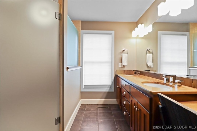 bathroom with vanity, tile patterned floors, and an enclosed shower