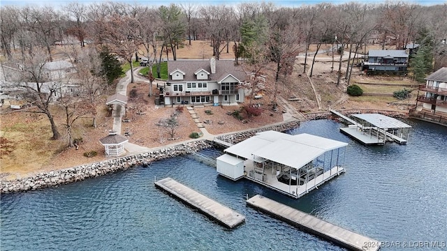 drone / aerial view with a water view