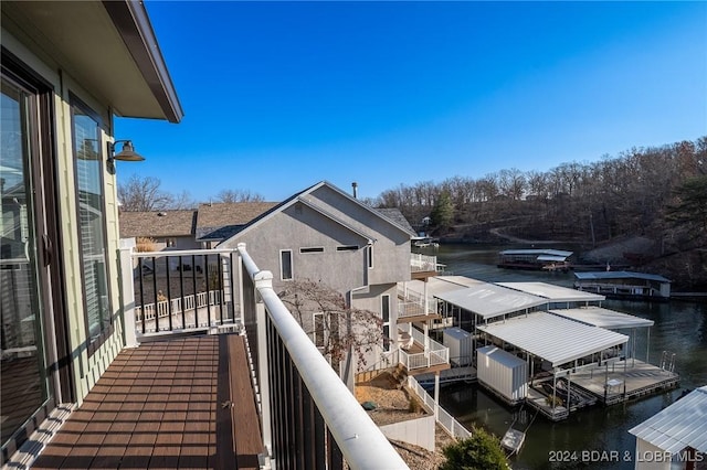 balcony featuring a water view