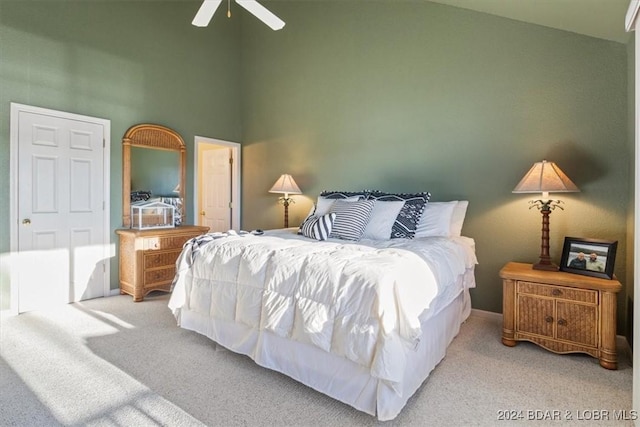 4800 Eagleview Dr Unit 241A, Osage Beach, MO 65065 - carpeted bedroom featuring a high ceiling and a ceiling fan