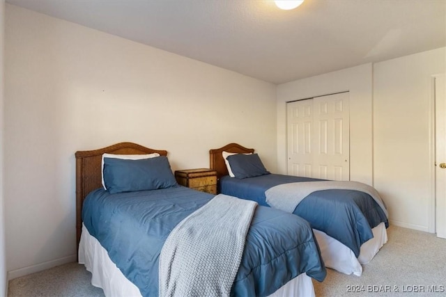 4800 Eagleview Dr Unit 241A, Osage Beach, MO 65065 - bedroom featuring carpet floors and a closet