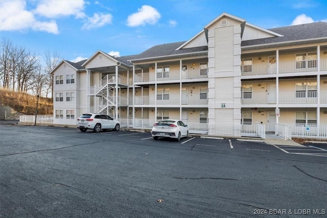 4800 Eagleview Dr Unit 241A, Osage Beach, MO 65065 - view of apartment building / complex with uncovered parking
