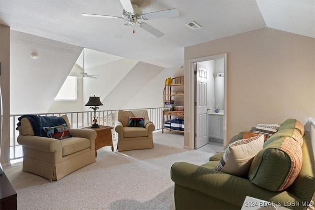 4800 Eagleview Dr Unit 241A, Osage Beach, MO 65065 - living room featuring a ceiling fan, vaulted ceiling, and carpet flooring