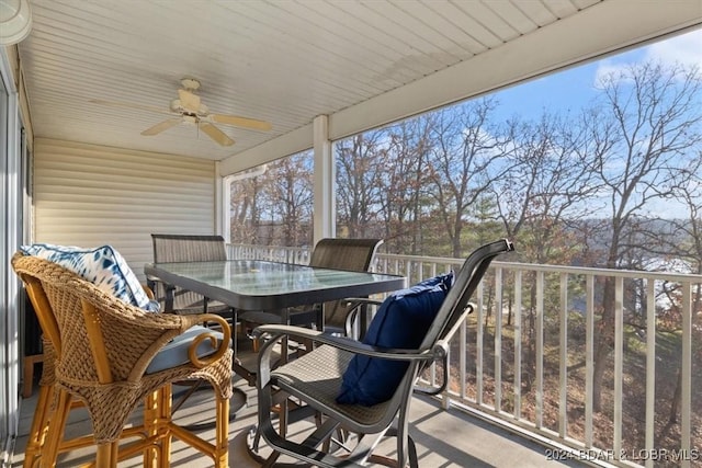4800 Eagleview Dr Unit 241A, Osage Beach, MO 65065 - sunroom featuring a ceiling fan, outdoor dining area, and healthy amount of natural light