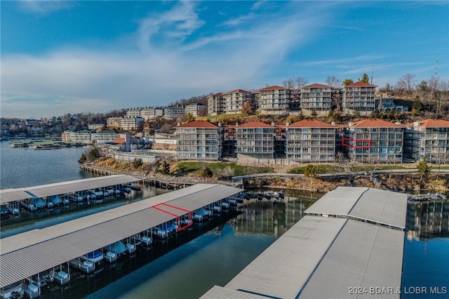 drone / aerial view featuring a water view