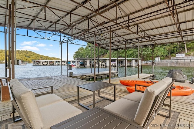 dock area with a water view