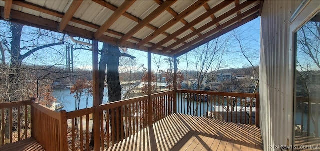 deck featuring a water view