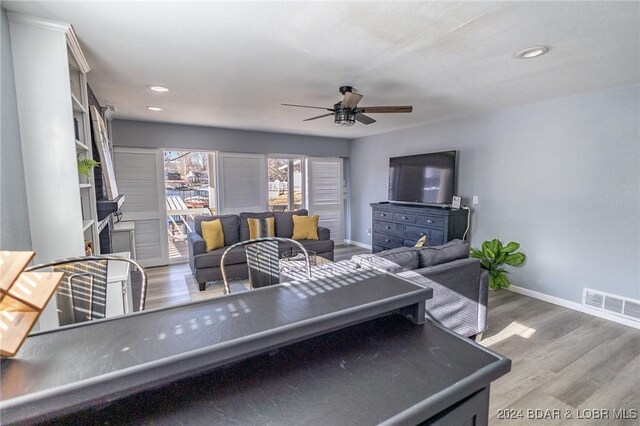 6455 Running Deer Dr, Osage Beach, MO 65065 - living area with ceiling fan, wood finished floors, and recessed lighting
