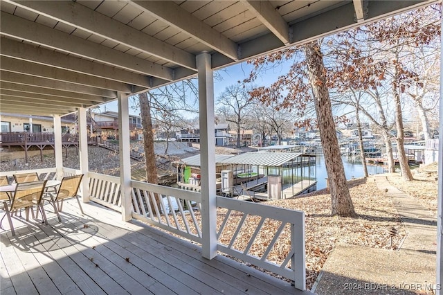 6455 Running Deer Dr, Osage Beach, MO 65065 - wooden terrace featuring a water view