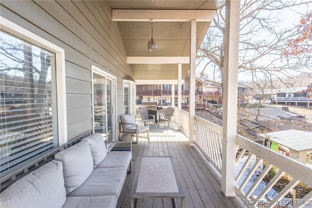 deck featuring an outdoor living space