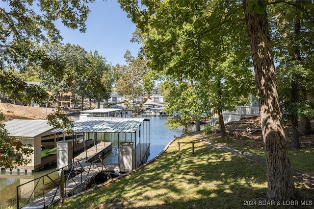 6455 Running Deer Dr, Osage Beach, MO 65065 - dock area featuring a water view and boat lift