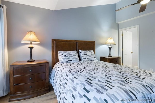 bedroom featuring light hardwood / wood-style flooring and ceiling fan