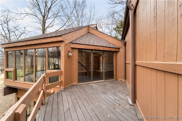 wooden terrace with a sunroom