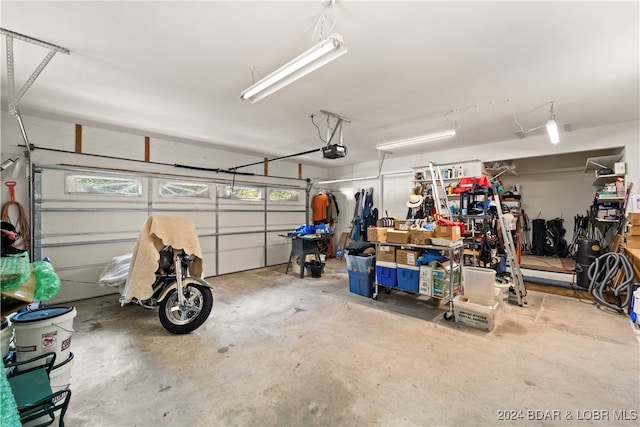 garage featuring a garage door opener